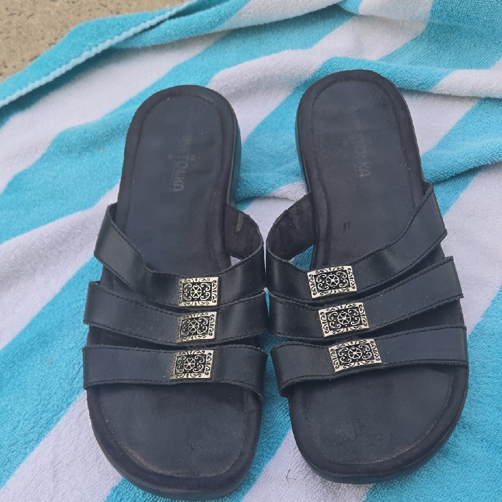 Minnetonka Black Slide Sandals with Silver Accents